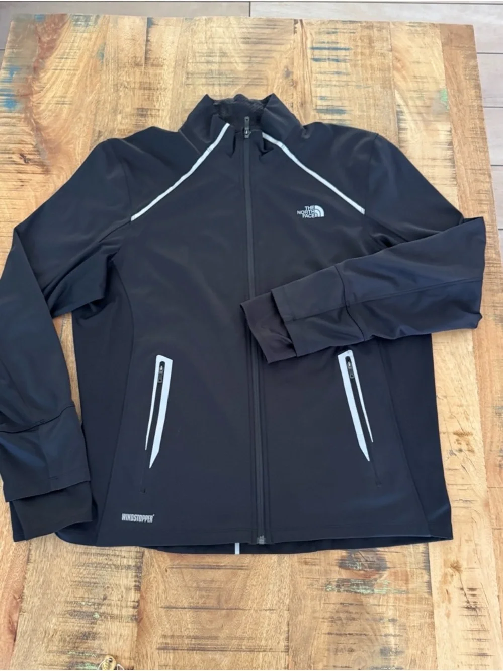 The North Face Men’s Black Lightweight Windstopper Jacket with Reflective Trim